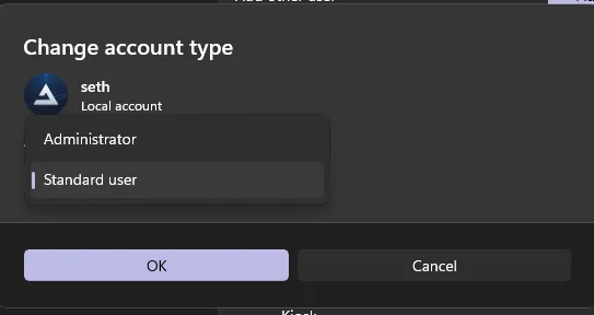 The Windows Change account type dialog with the dropdown open, showing Administrator and Standard user, with Standard user highlighted.